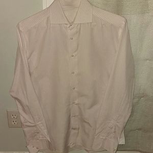 A pink and white Striped tailor-made dress shirt.
